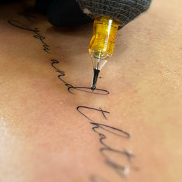 Schriftzug am Unterarm – Tattoo aus Köln