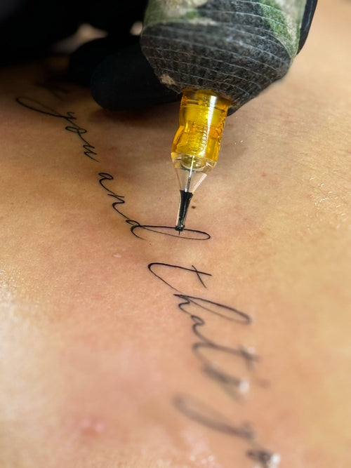 Schriftzug am Unterarm